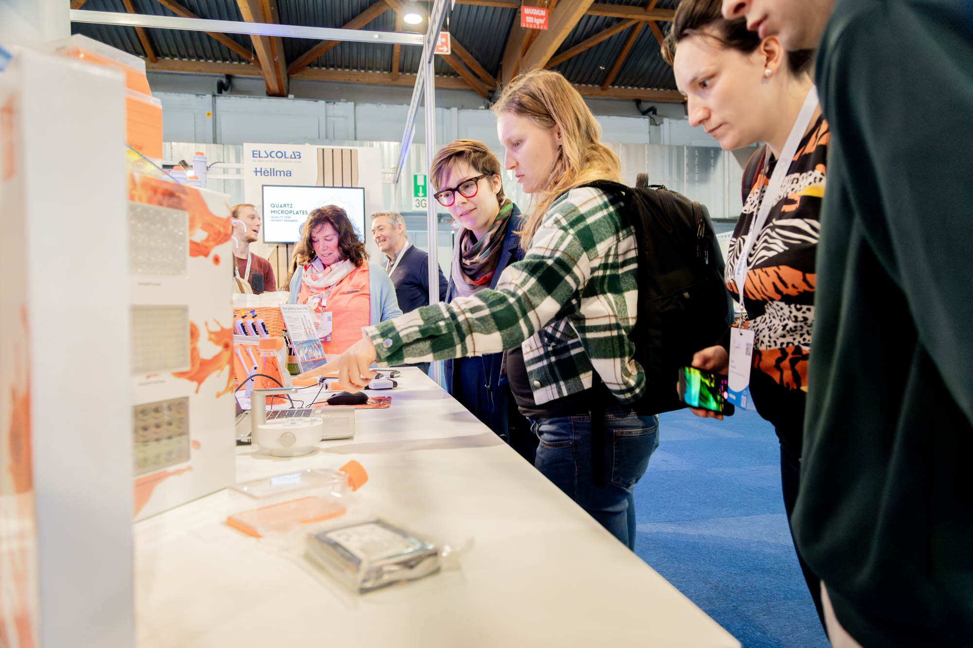 Laboratory demonstration with equipment and engaged visitors at Laborama